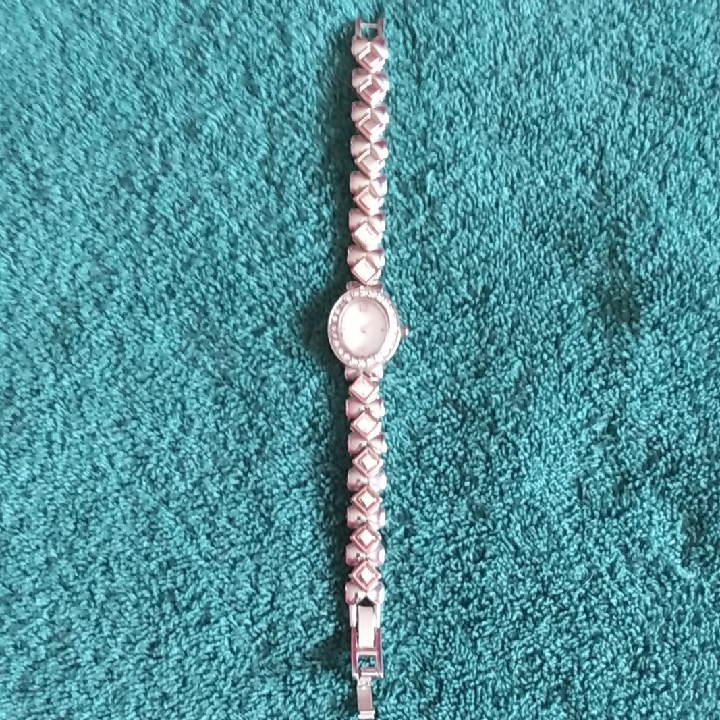 Elegant Silver Watch With Diamond Accents Elegant Silver Watch With Diamond Accents